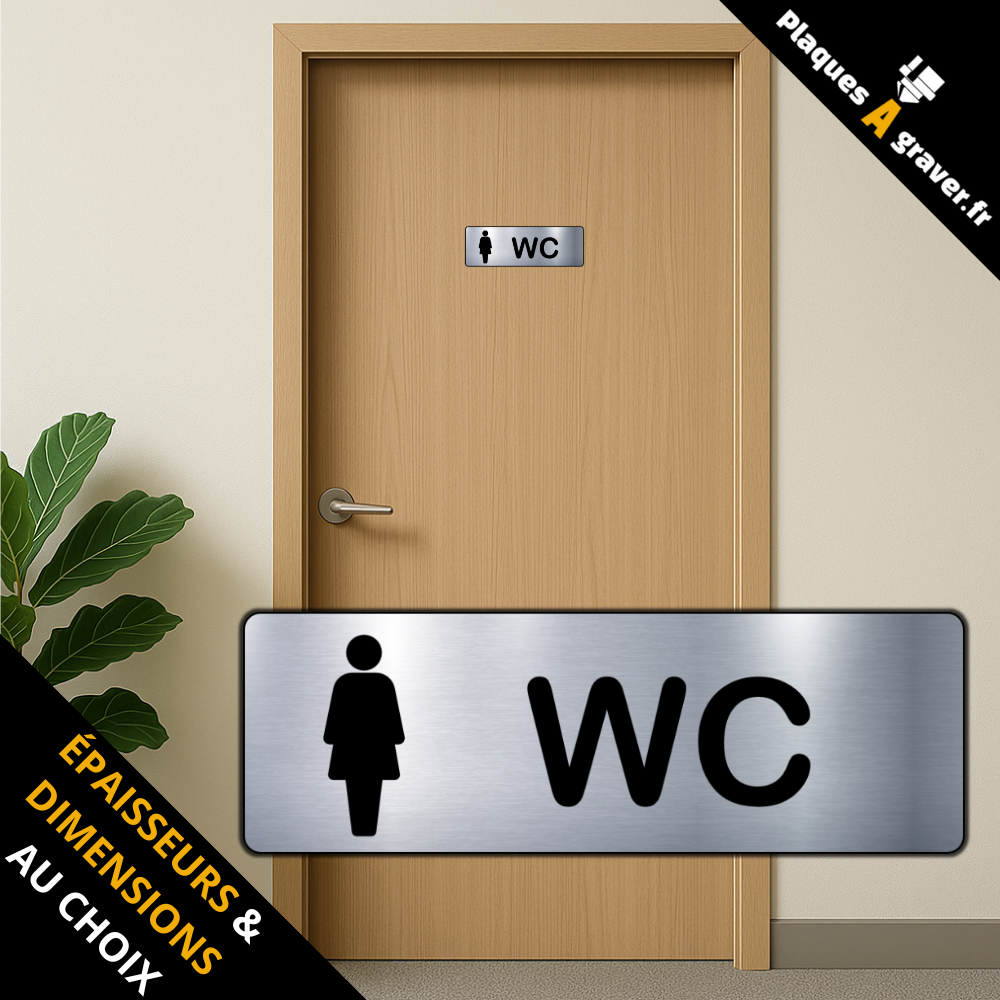plaque wc femme sur une porte dans un bâtiment professionnel